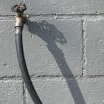 how to fix a leaky hose bib - Featured Image